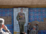 One of two remaining murals in Baghdad of Saddam Hussein.  This one is located on Camp Slayer.